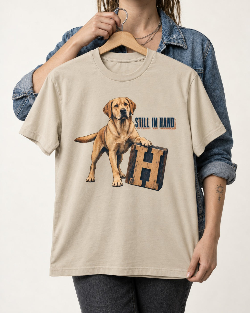 Labrador Retriever Still in Hand T-Shirt in Sand, held up on a hanger