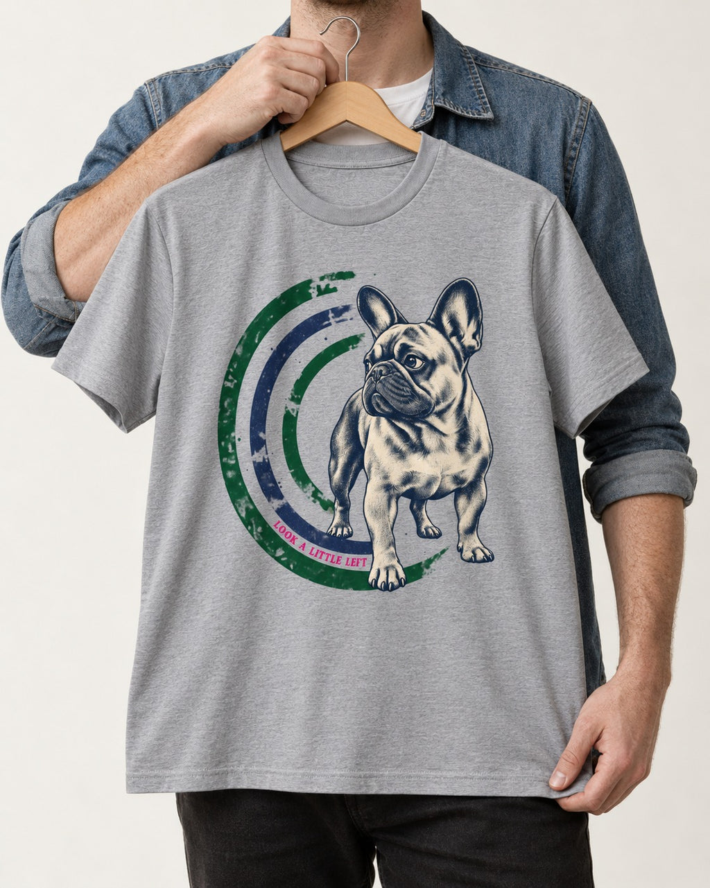 Frenchie Look a Little Left Orbit Graphic T-Shirt in Sport Grey, held up on a hanger