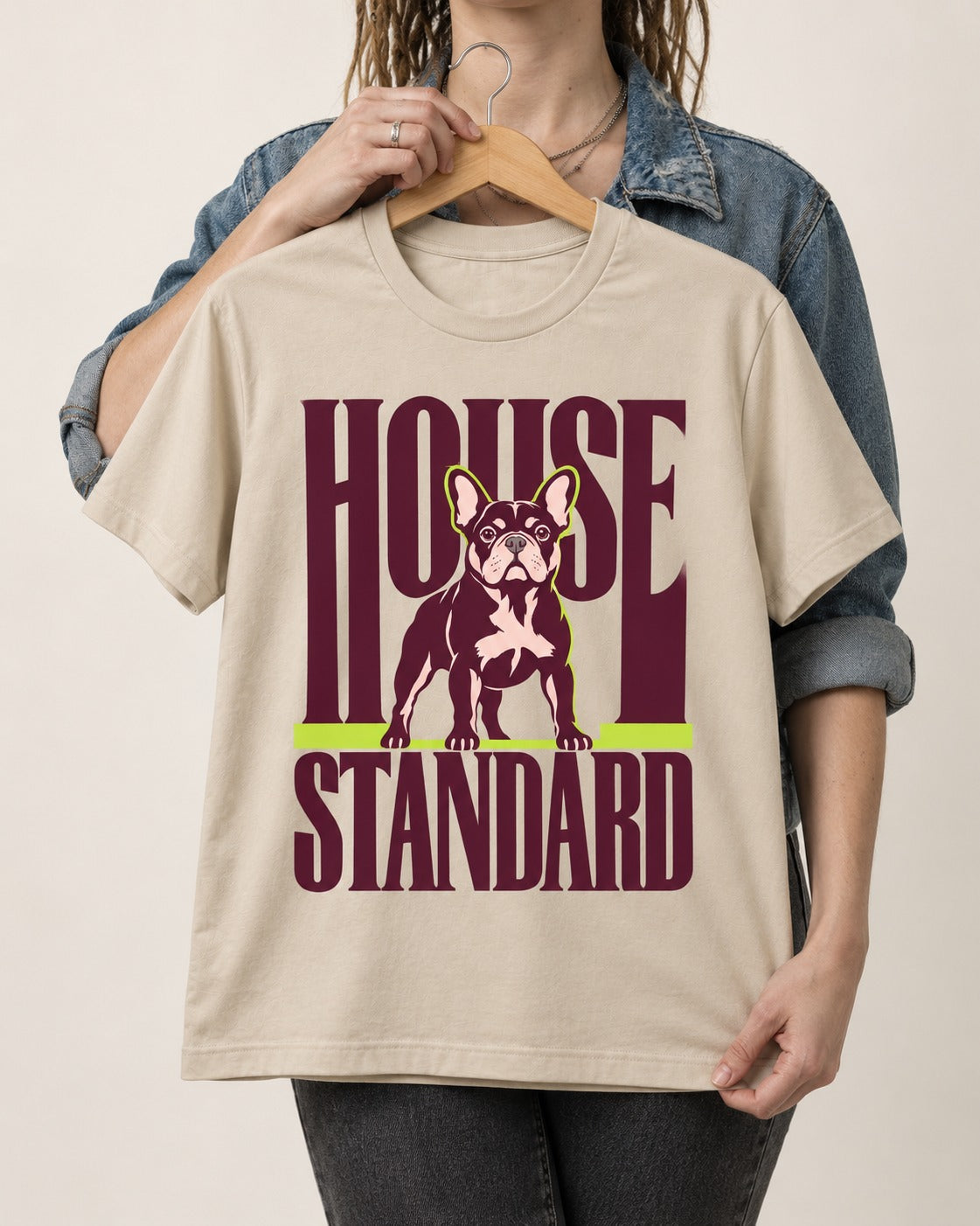 Frenchie House Standard T-Shirt in Sand, held up on a hanger