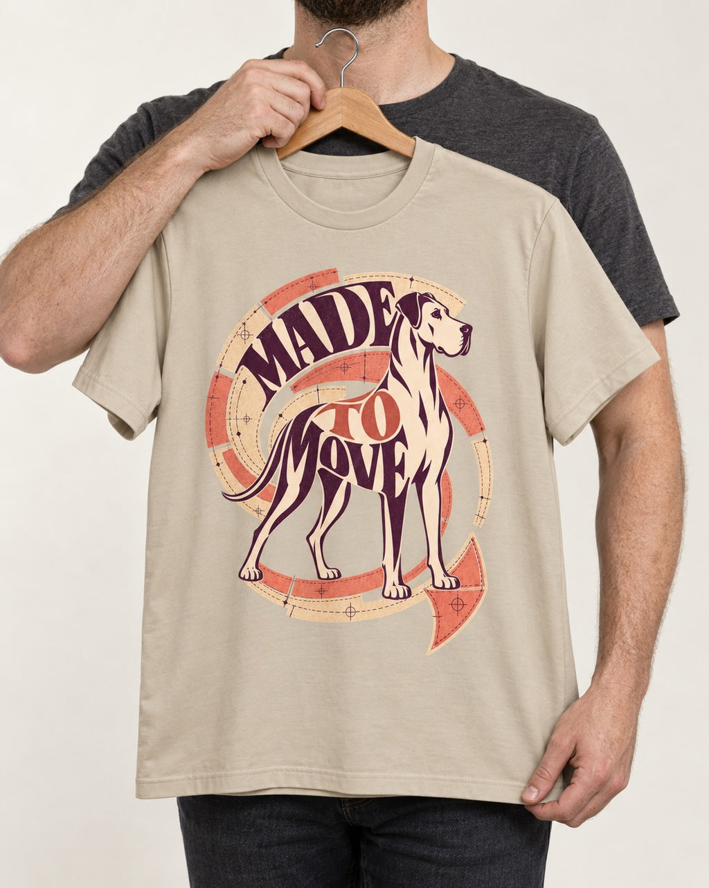 Great Dane Made to Move T-Shirt in Sand, held up on a hanger
