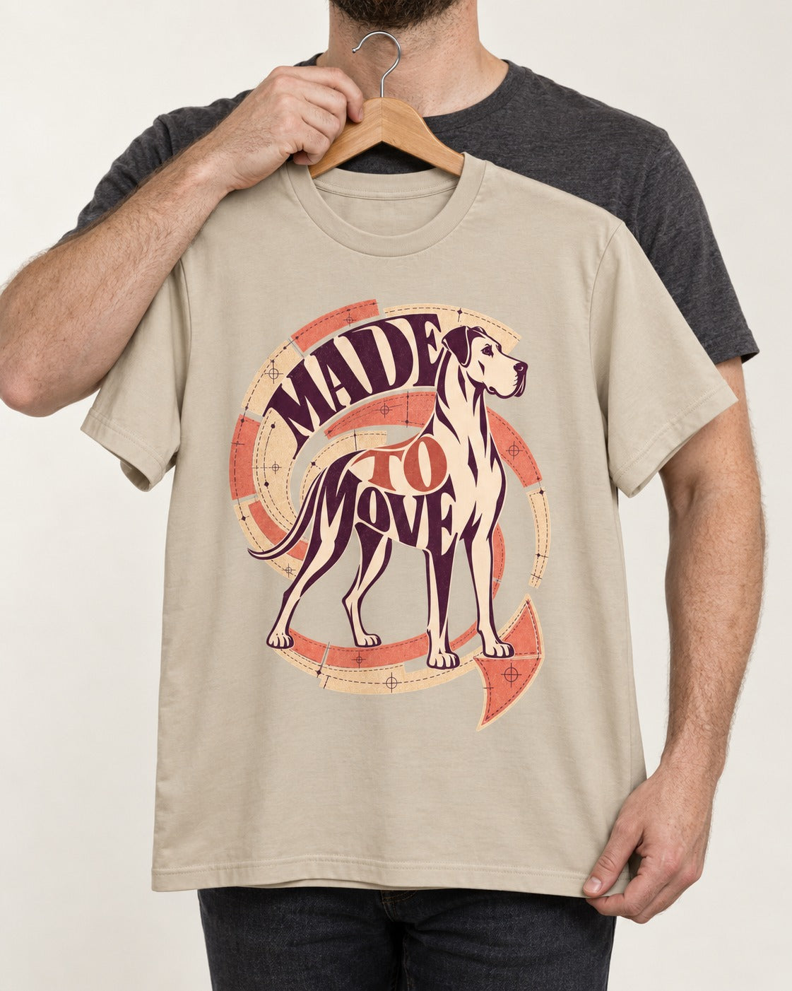 Great Dane Made to Move T-Shirt in Sand, held up on a hanger