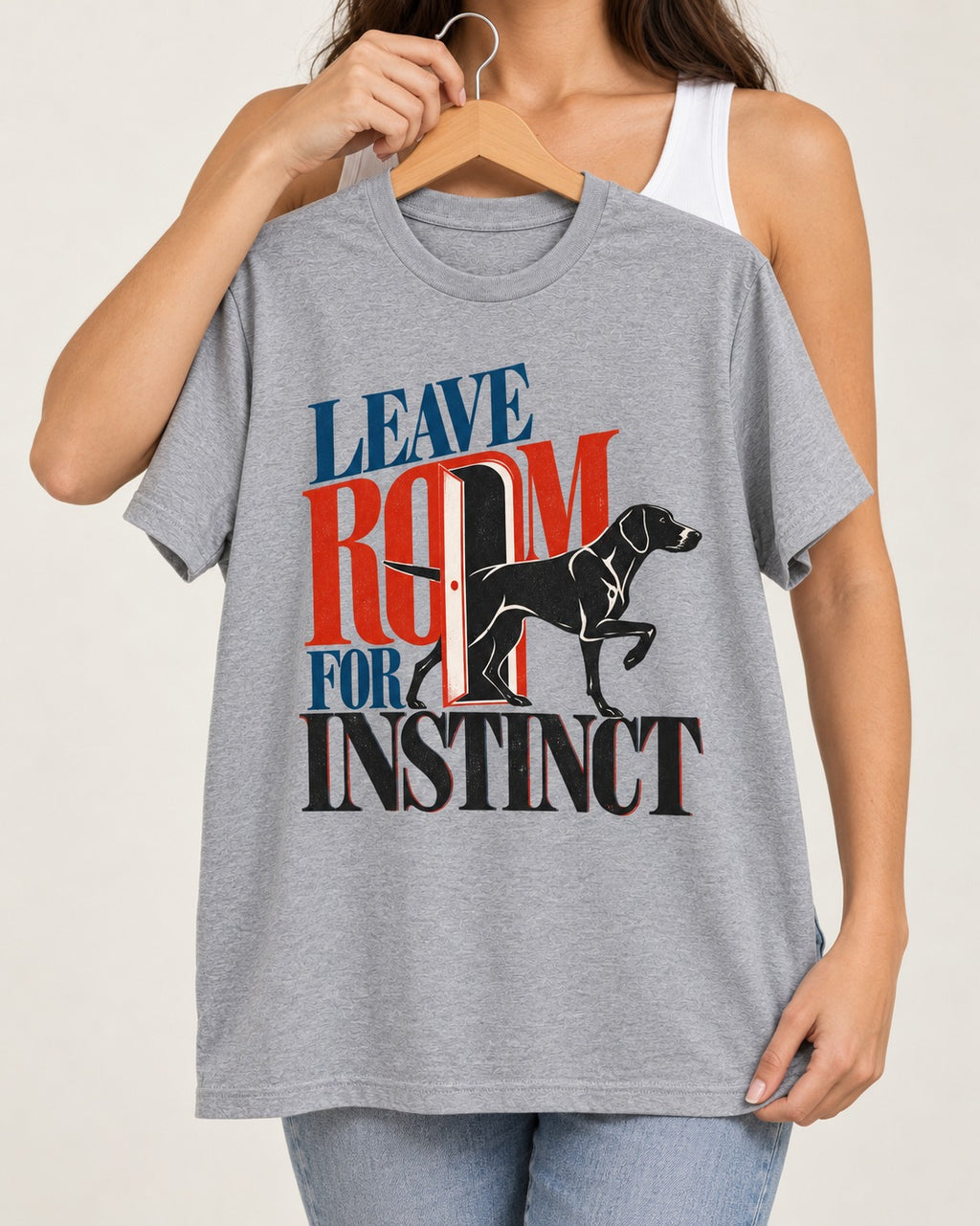 Leave Room for Instinct German Shorthaired Pointer T-Shirt in Sport Grey, held up on a hanger