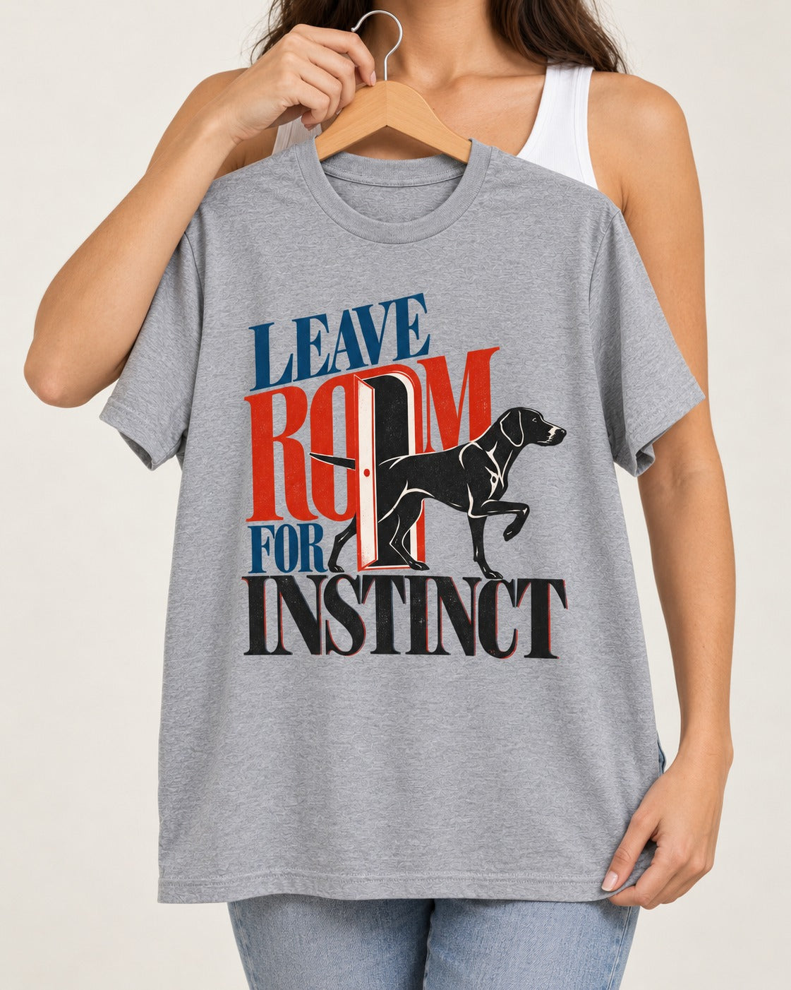 Leave Room for Instinct German Shorthaired Pointer T-Shirt in Sport Grey, held up on a hanger