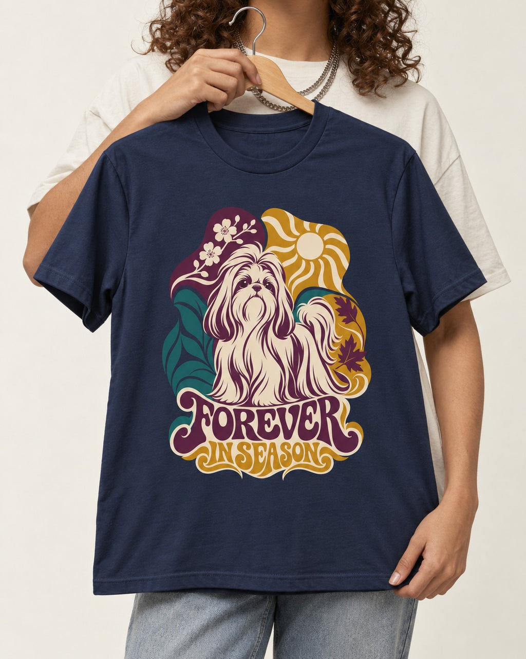 Shih Tzu Forever in Season Botanical Sun Graphic T-Shirt in Navy, held up on a hanger