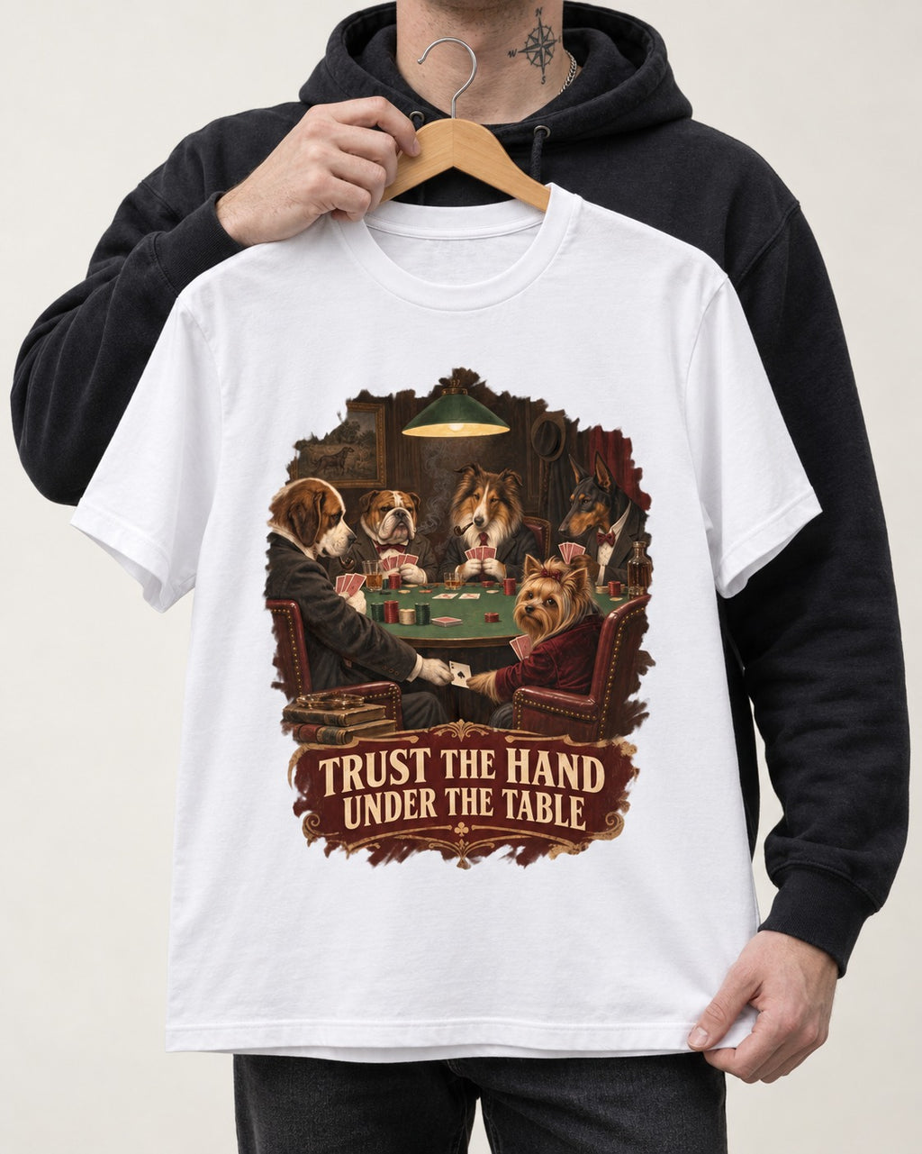 Yorkshire Terrier Trust the Hand Under the Table Poker Dogs Graphic T-Shirt in White, held up on a hanger