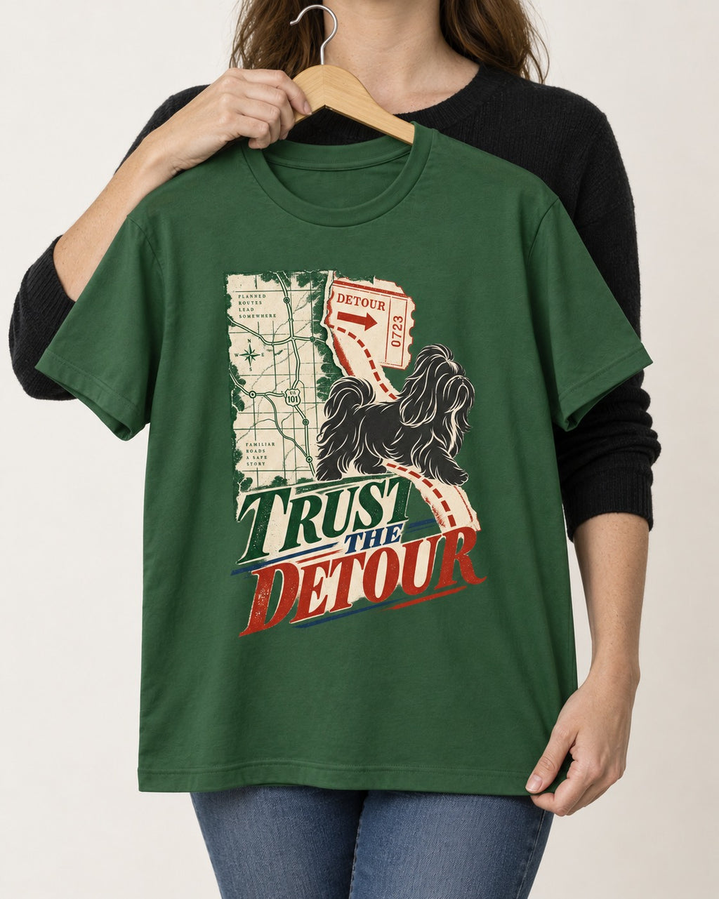 Shih Tzu Trust the Detour Road Map Graphic T-Shirt in Forest Green, held up on a hanger