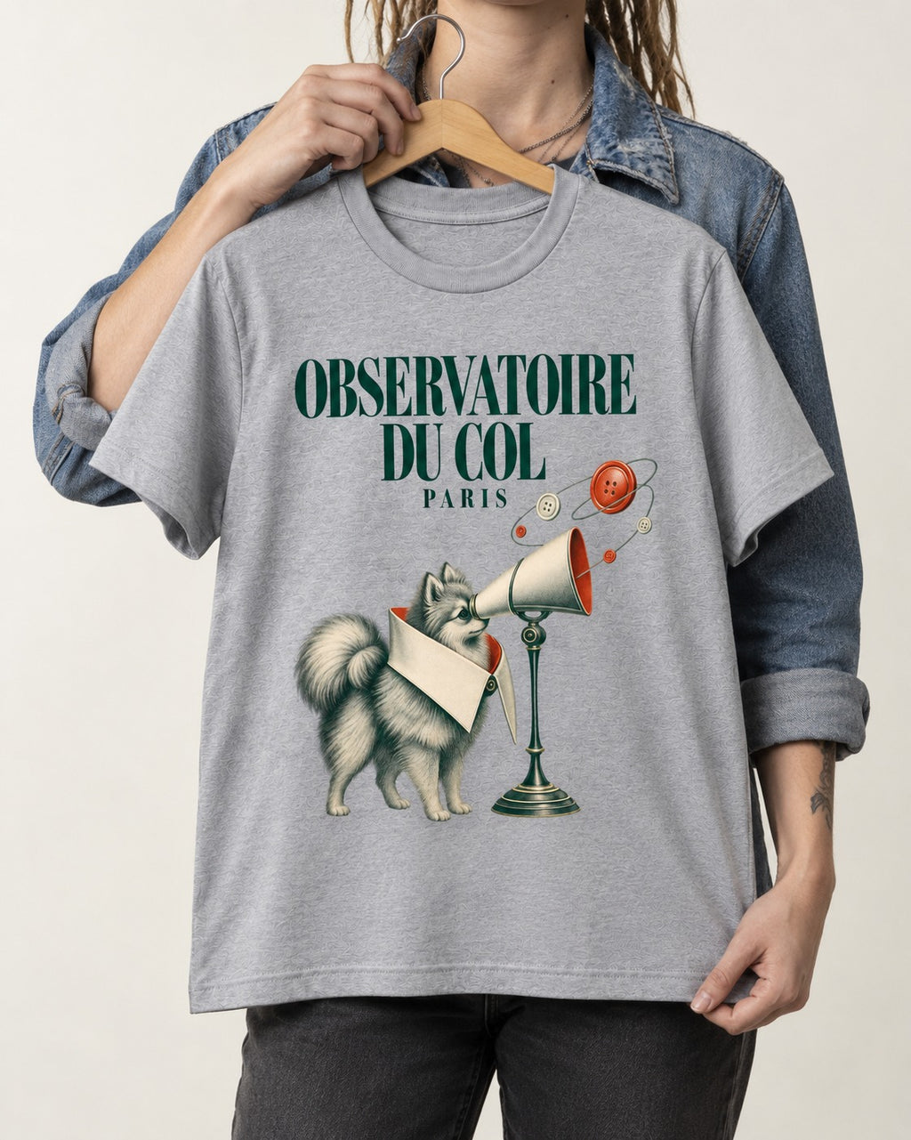Pomeranian Observatoire Du Col T-Shirt in Sport Grey, held up on a hanger