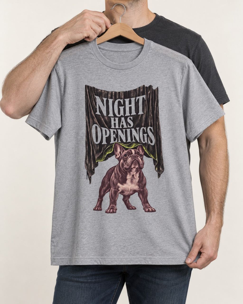 Night Has Openings Frenchie T-Shirt in Sport Grey, held up on a hanger