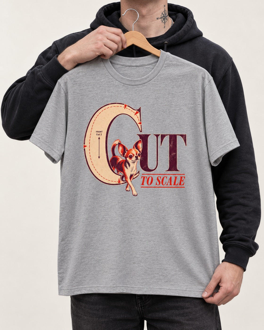 Chihuahua Cut to Scale Sewing Pattern Graphic T-Shirt in Sport Grey, held up on a hanger