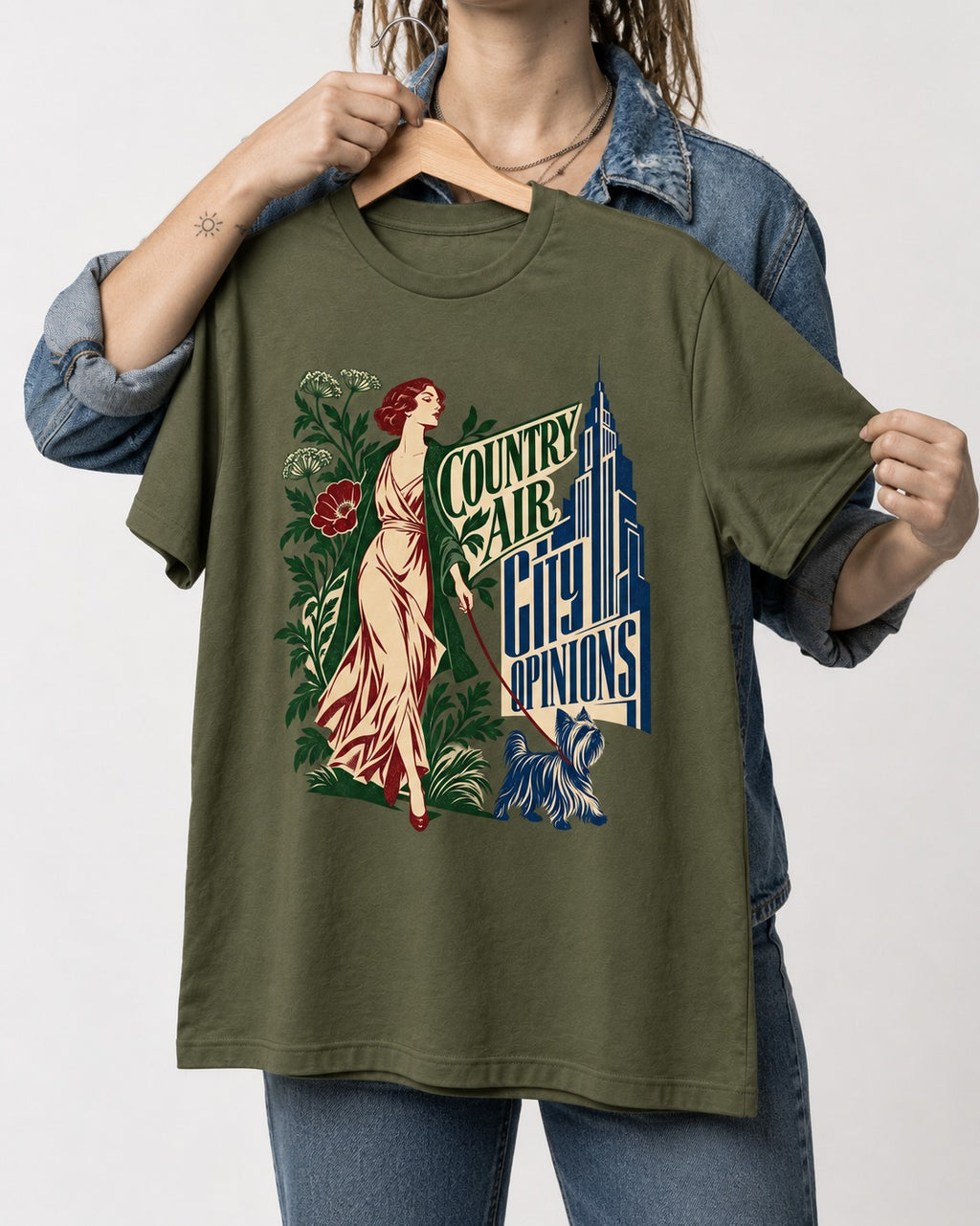 Yorkshire Terrier Country Air City Opinions Botanical Graphic T-Shirt in Heather Military Green, held up on a hanger