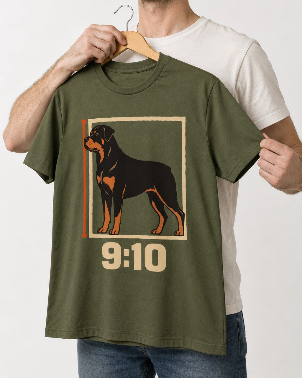 Nine Ten Rottweiler Proportion Frame Graphic T-Shirt in Heather Military Green, held up on a hanger