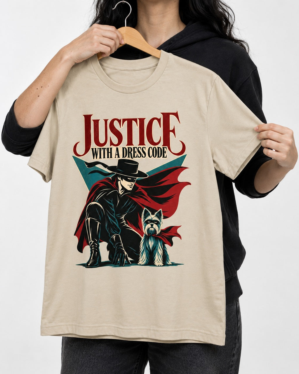 Yorkshire Terrier Dress Code Justice T-Shirt in Sand, held up on a hanger