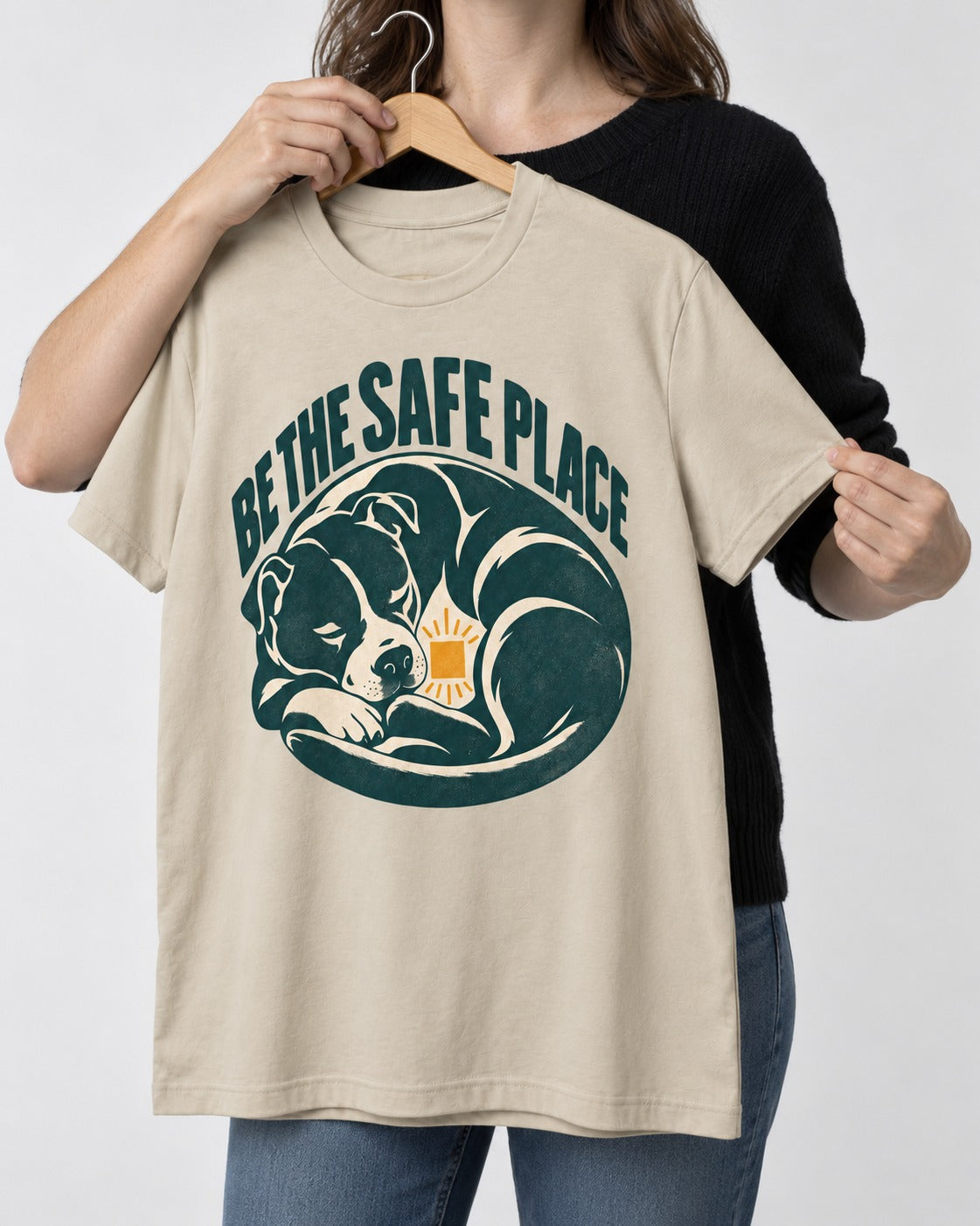 Pitbull Safe Place T-Shirt in Sand, held up on a hanger