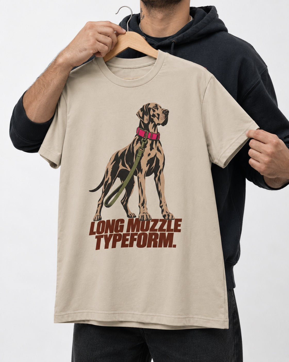Long Muzzle Typeform Great Dane T-Shirt in Sand, held up on a hanger