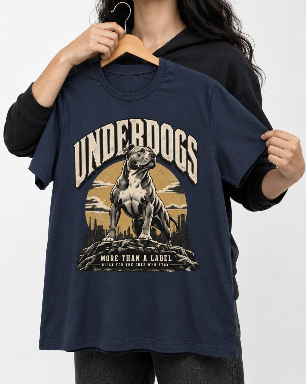 Pitbull Underdogs City Monument Graphic T-Shirt in Navy, held up on a hanger