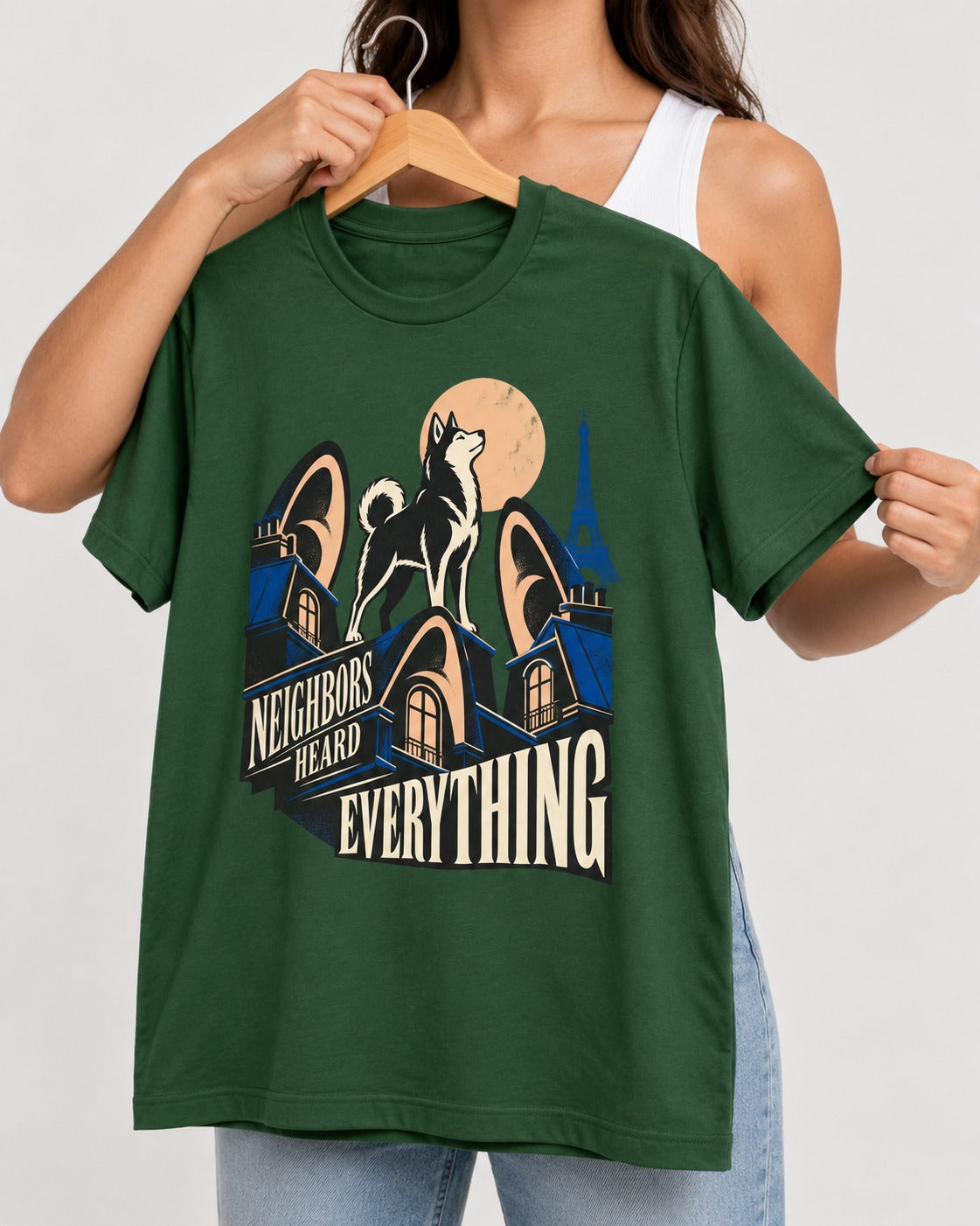 Husky Neighbors Heard Everything Paris Rooftop Graphic T-Shirt in Forest Green, held up on a hanger