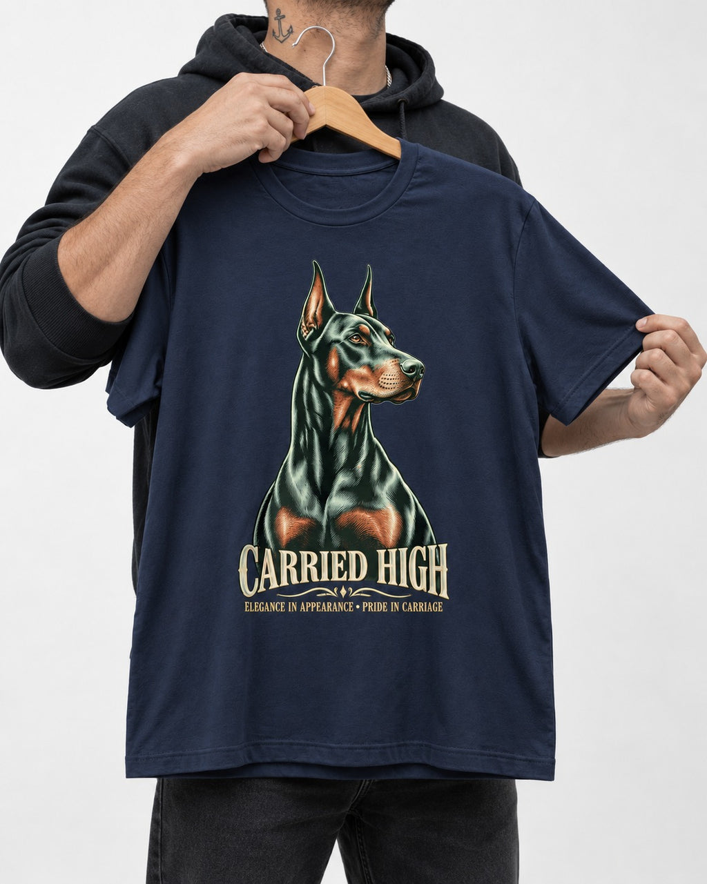 Doberman Carried High Portrait Graphic T-Shirt in Navy, held up on a hanger