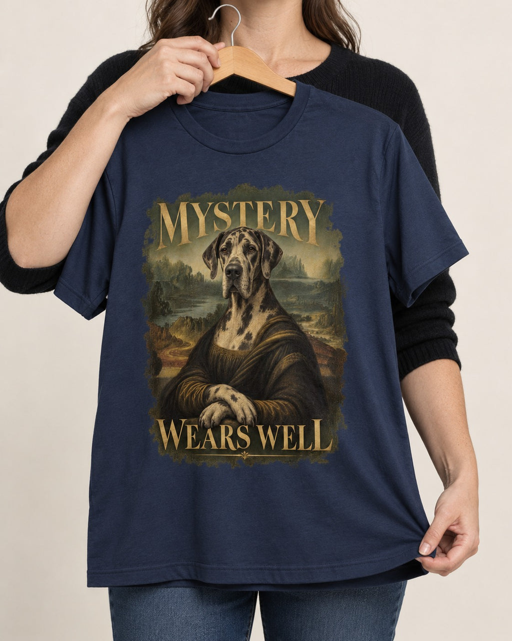 Great Dane Mystery Wears Well Renaissance Portrait Graphic T-Shirt in Navy, held up on a hanger