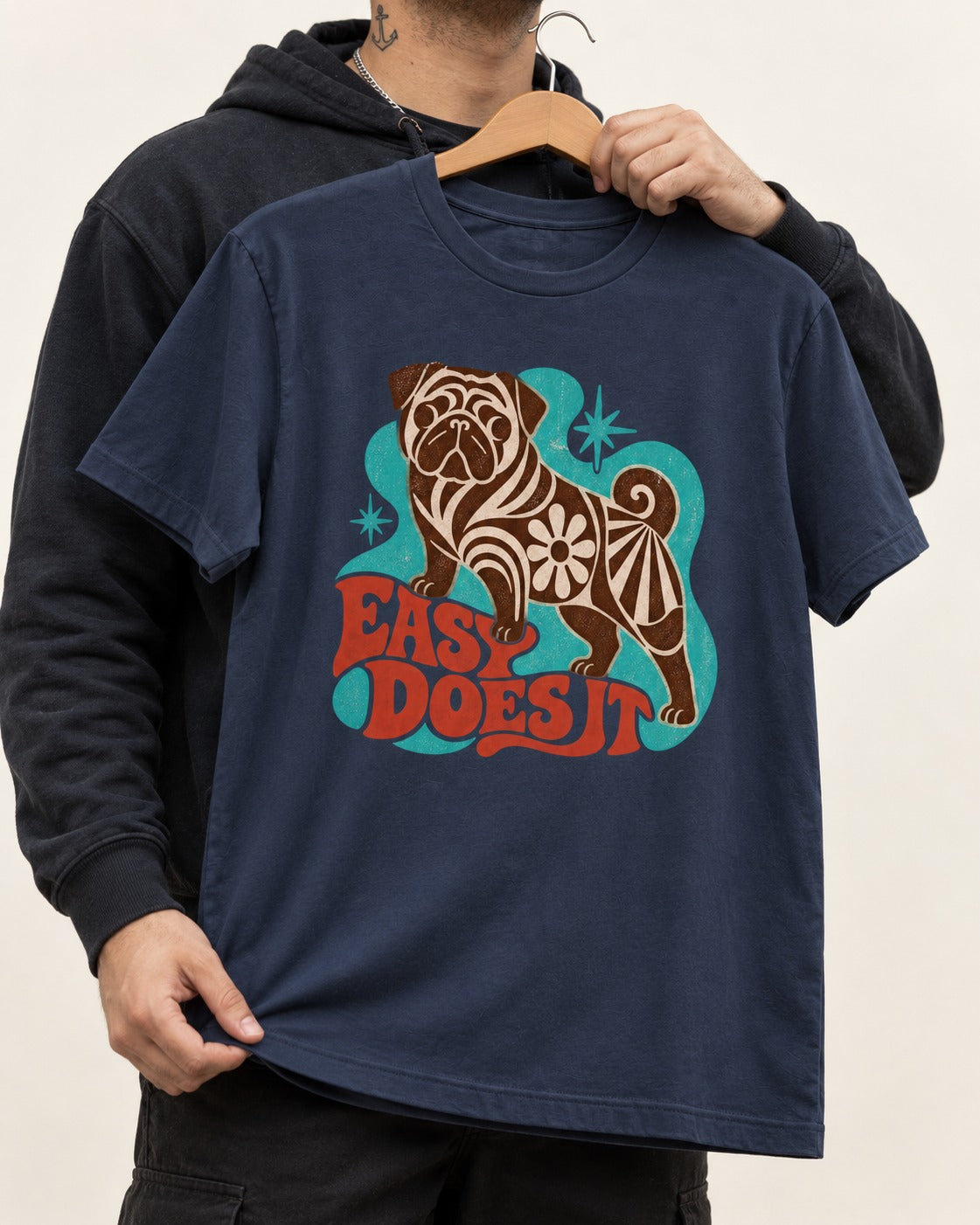 Pug Easy Does It Retro Floral Graphic T-Shirt in Navy, held up on a hanger