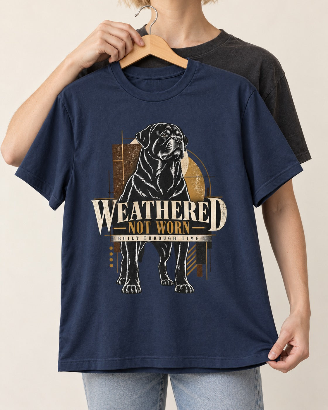Rottweiler Weathered Not Worn Geometric Graphic T-Shirt in Navy, held up on a hanger
