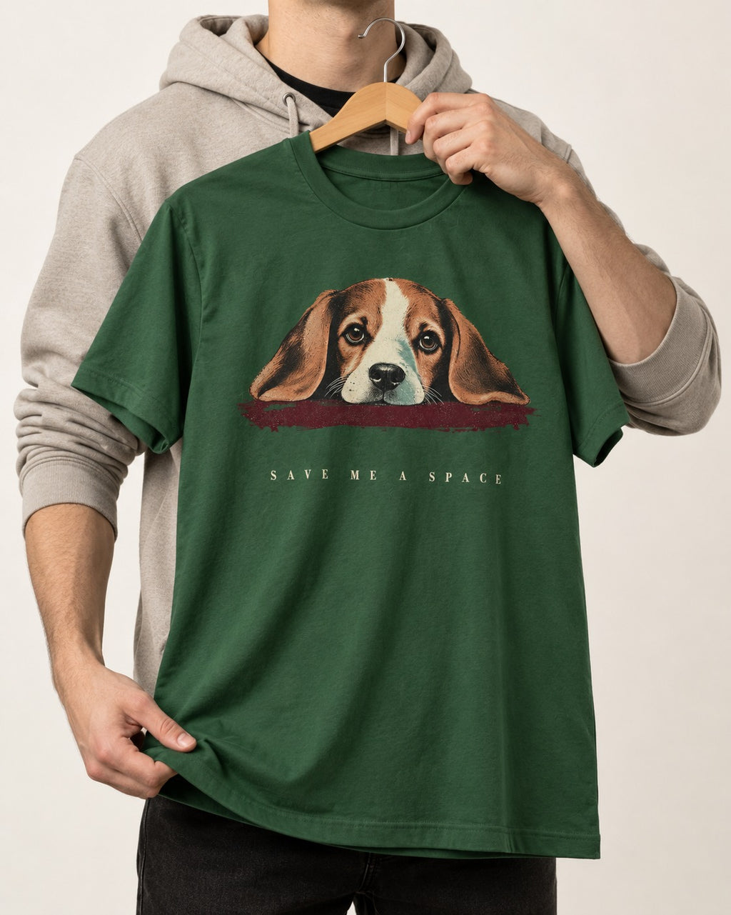 Save Me A Space Beagle T-Shirt in Forest Green, held up on a hanger
