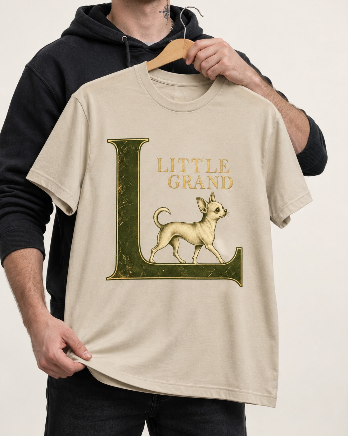 Little Grand Chihuahua T-Shirt in Sand, held up on a hanger