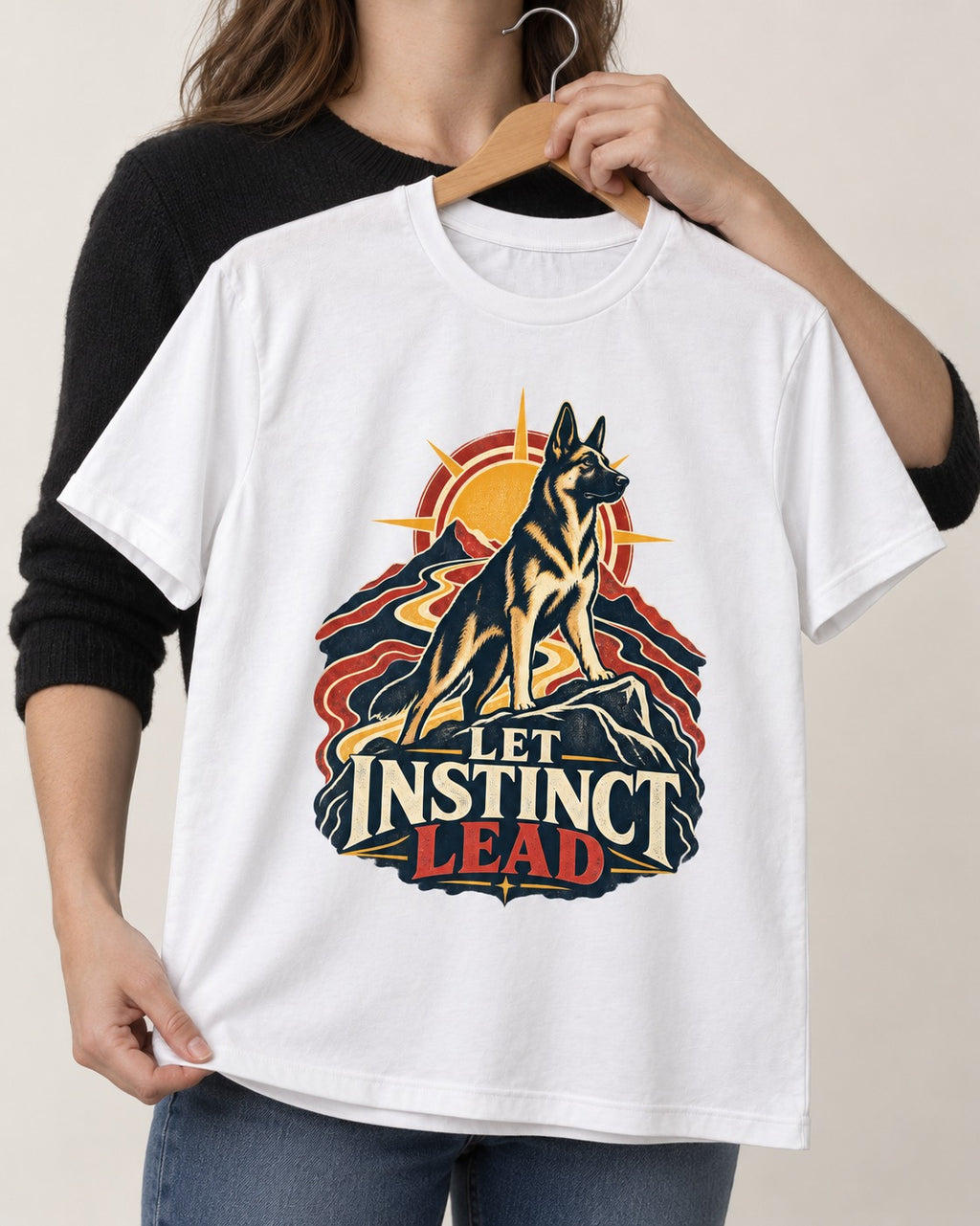 Let Instinct Lead Sunrise German Shepherd Dog Graphic T-Shirt in White, held up on a hanger