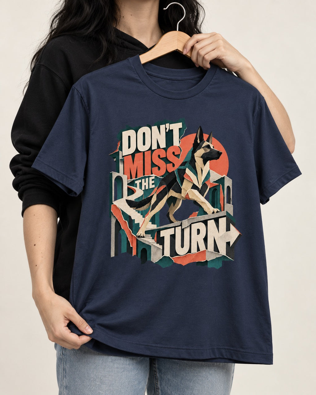 Dont Miss The Turn Escher Staircase German Shepherd Dog Graphic T-Shirt in Navy, held up on a hanger