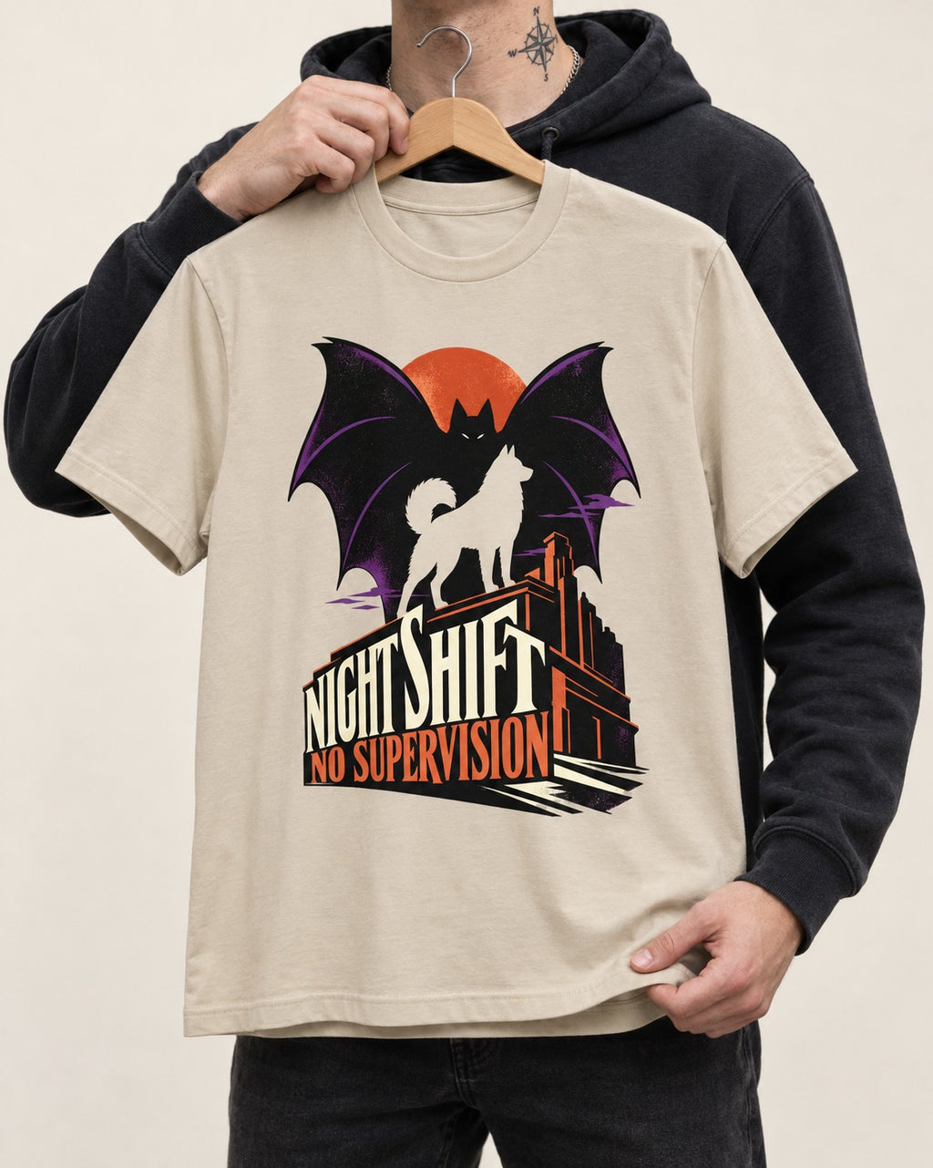 Husky Night Shift No Supervision T-Shirt in Sand, held up on a hanger