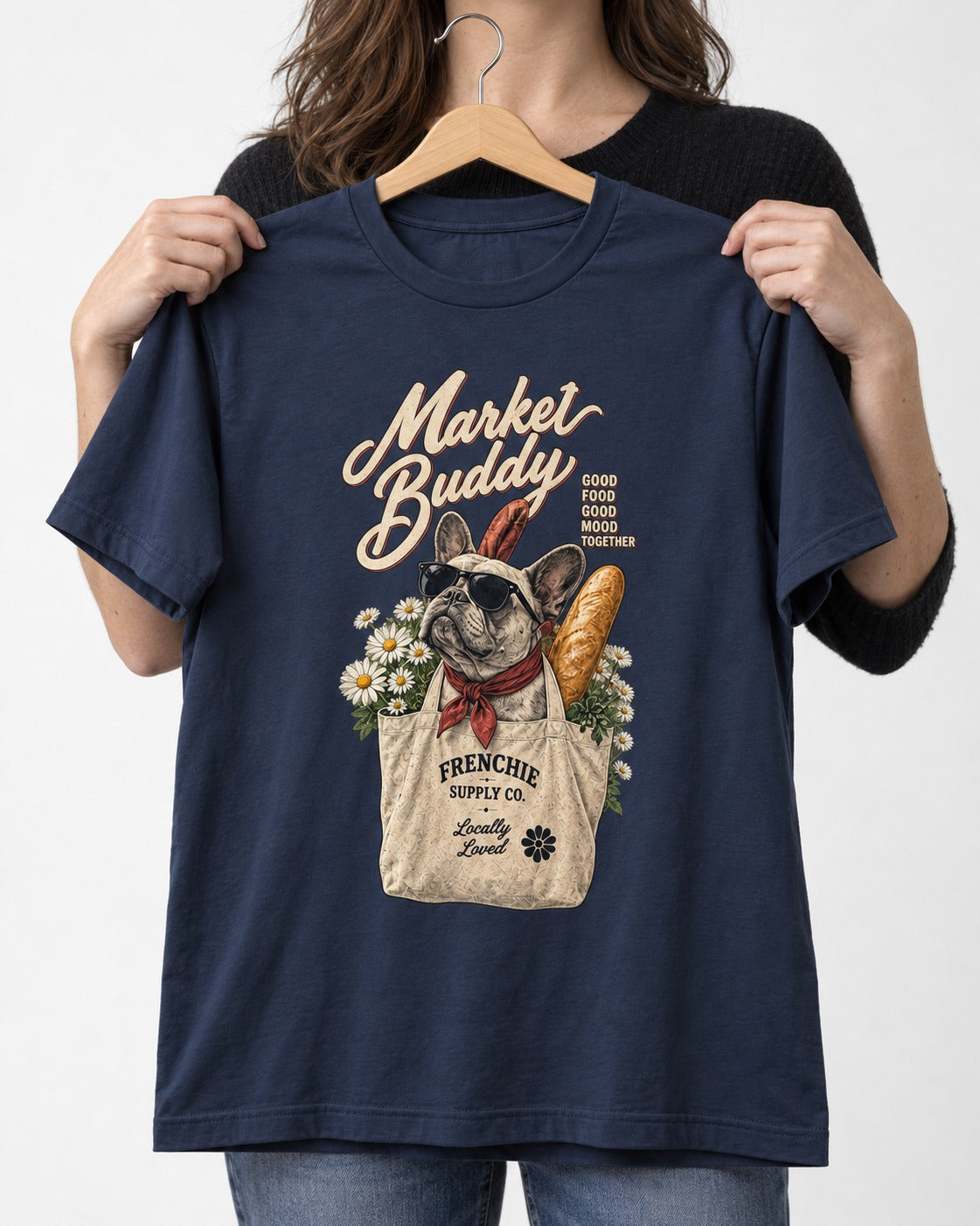 Frenchie Market Buddy Grocery Tote Graphic T-Shirt in Navy, held up on a hanger