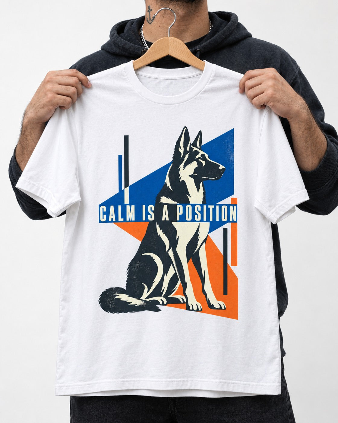 Calm Is A Position Geometric German Shepherd Dog Graphic T-Shirt in White, held up on a hanger