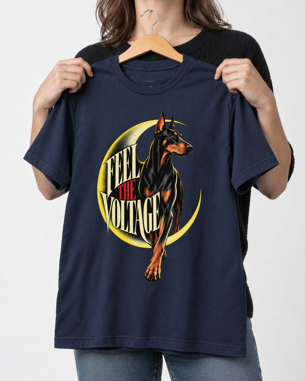 Doberman Feel the Voltage Crescent Portrait Graphic T-Shirt in Navy, held up on a hanger