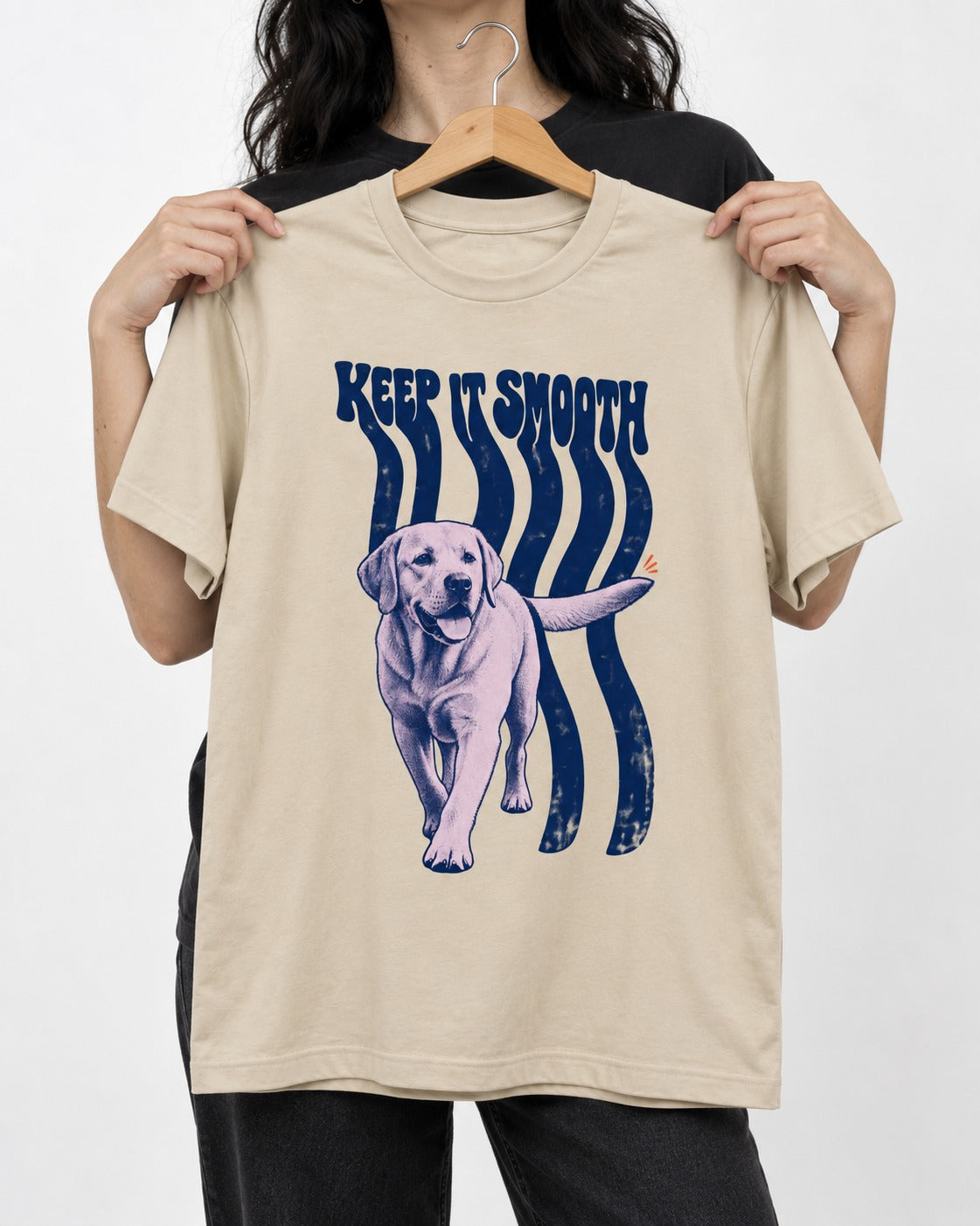 Keep It Smooth Labrador Retriever T-Shirt in Sand, held up on a hanger