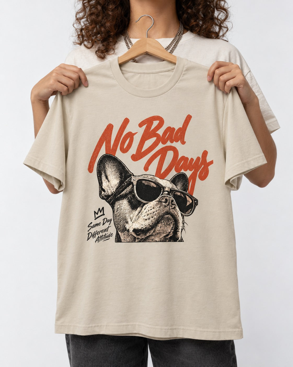 Frenchie No Bad Days T-Shirt in Sand, held up on a hanger