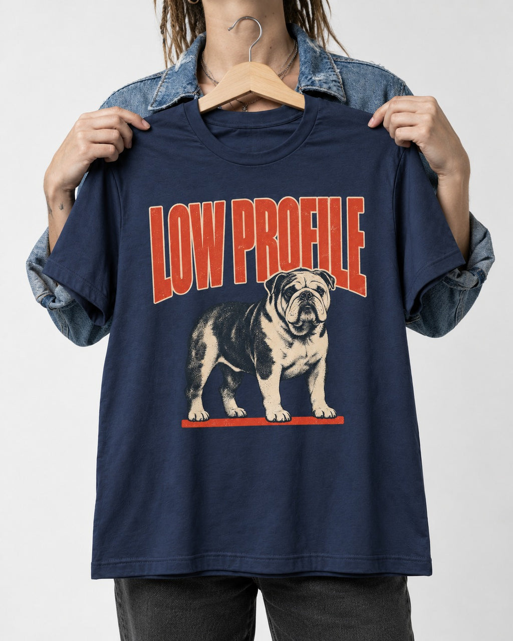 English Bulldog Low Profile Standing Graphic T-Shirt in Navy, held up on a hanger