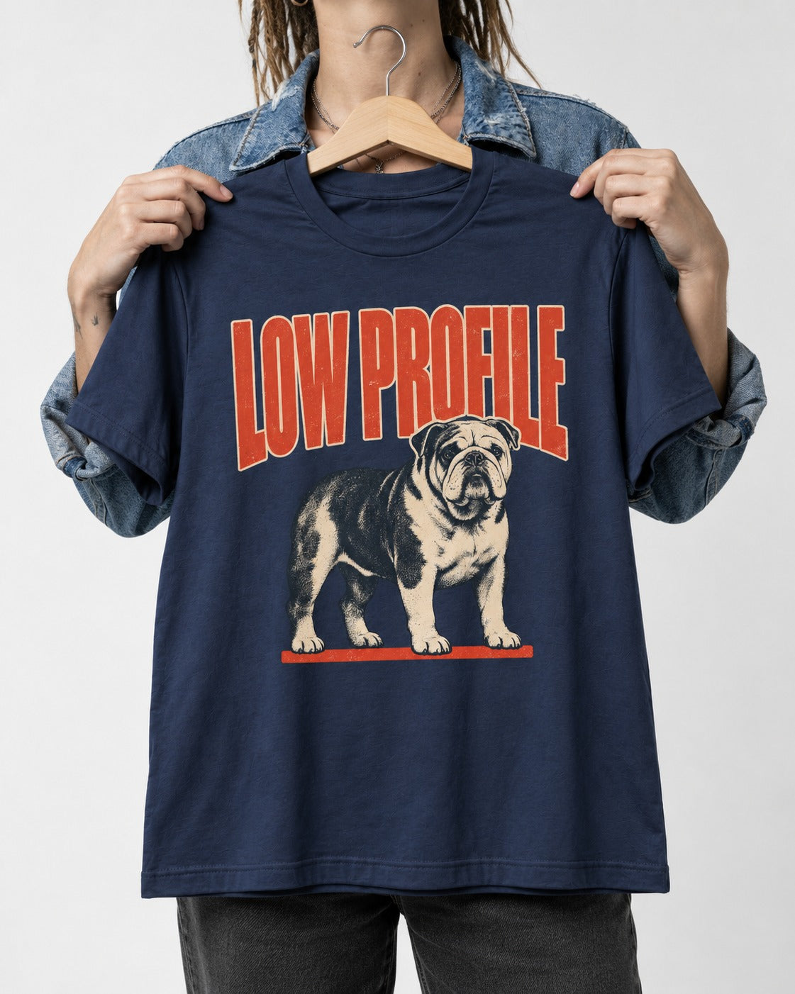 English Bulldog Low Profile Standing Graphic T-Shirt in Navy, held up on a hanger