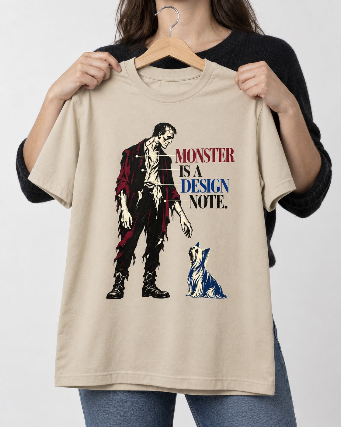 Yorkshire Terrier Monster T-Shirt in Sand, held up on a hanger