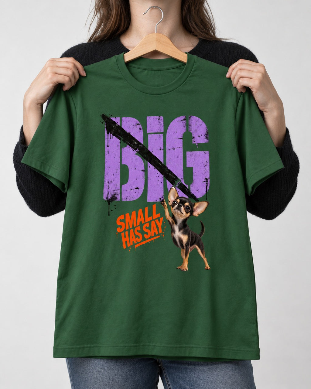 Chihuahua Big Small Has Say Diagonal Slash Graphic T-Shirt in Forest Green, held up on a hanger