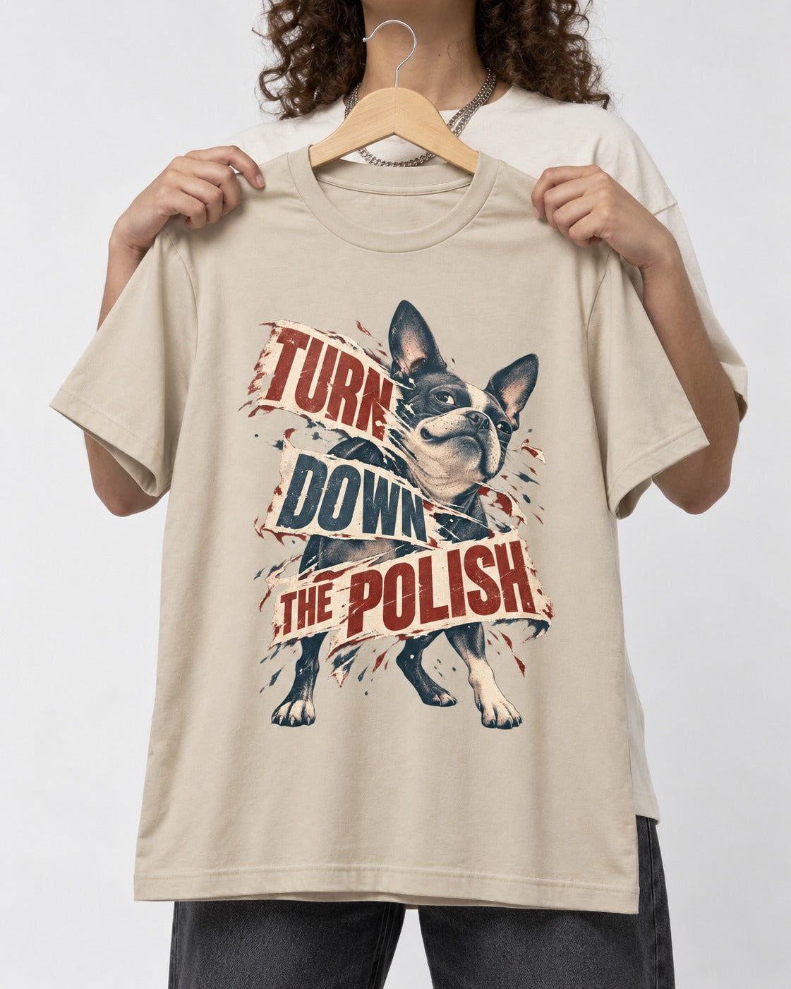 Turn Down the Polish Boston Terrier T-Shirt in Sand, held up on a hanger