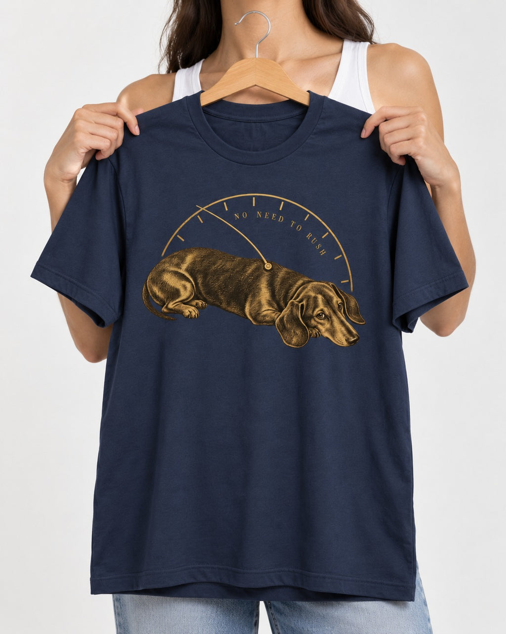 Dachshund No Need To Rush Gauge Graphic T-Shirt in Navy, held up on a hanger