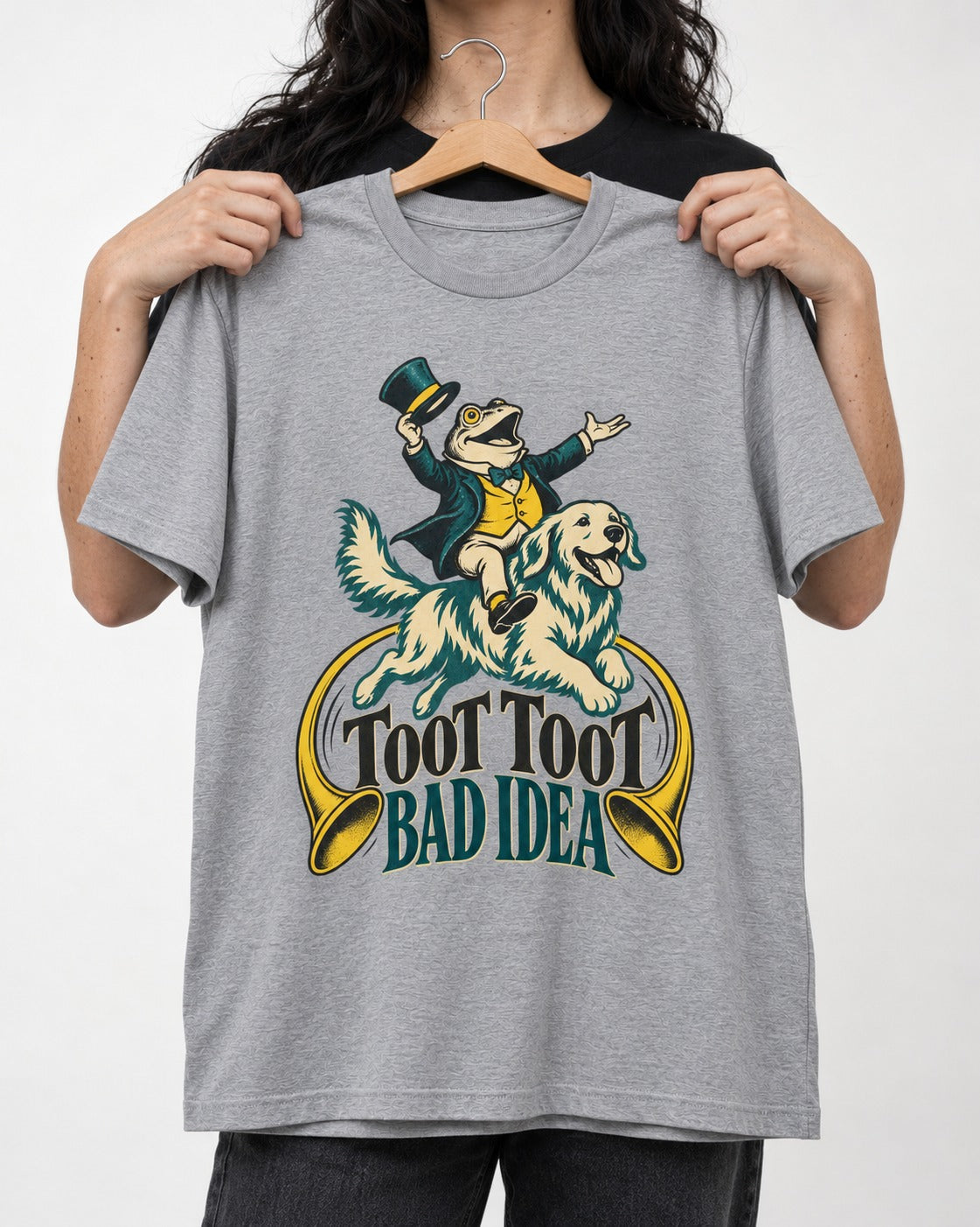 Golden Retriever Toot Toot Bad Idea T-Shirt in Sport Grey, held up on a hanger