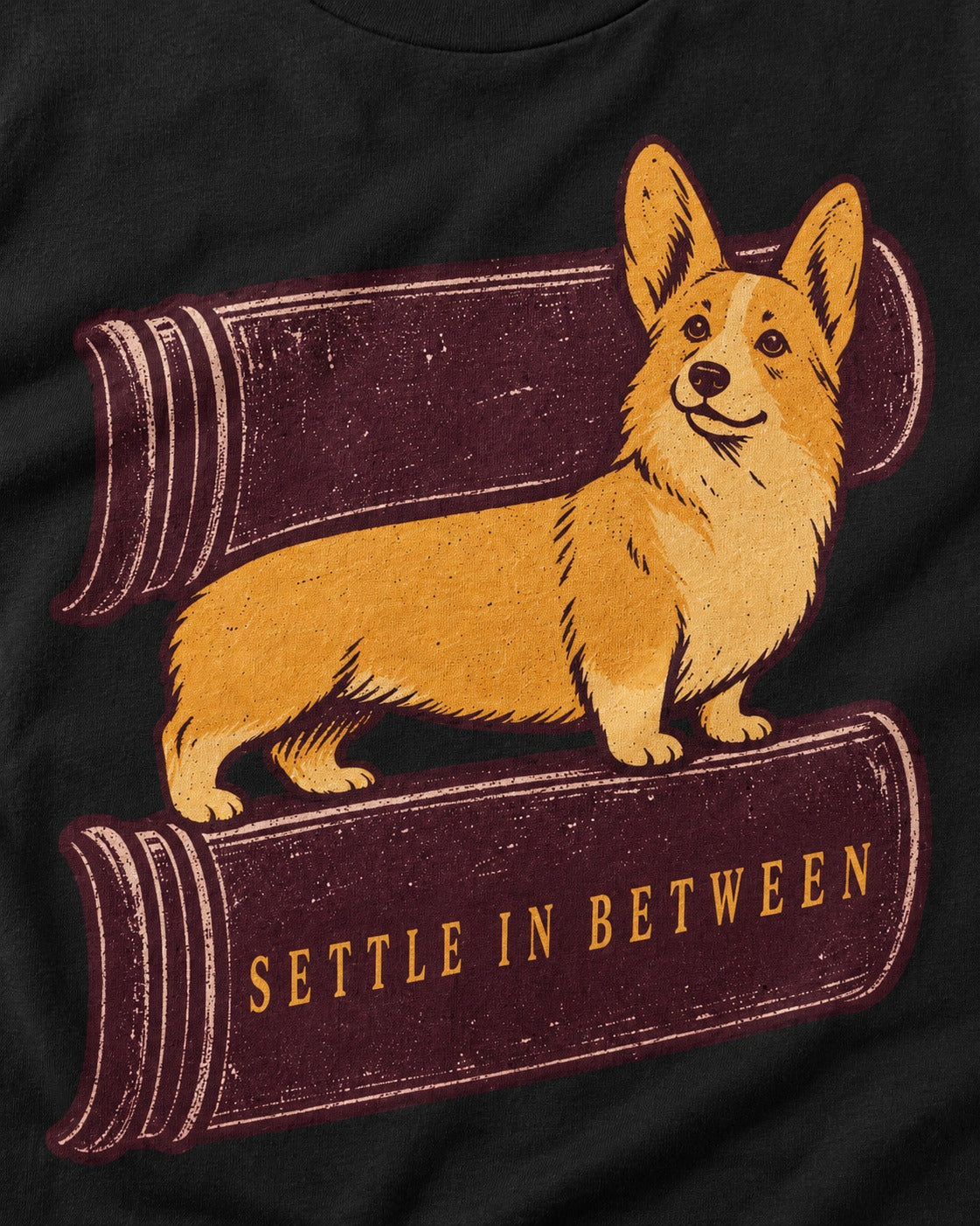 Corgi Settle in Between T-Shirt in Black, close-up of the graphic