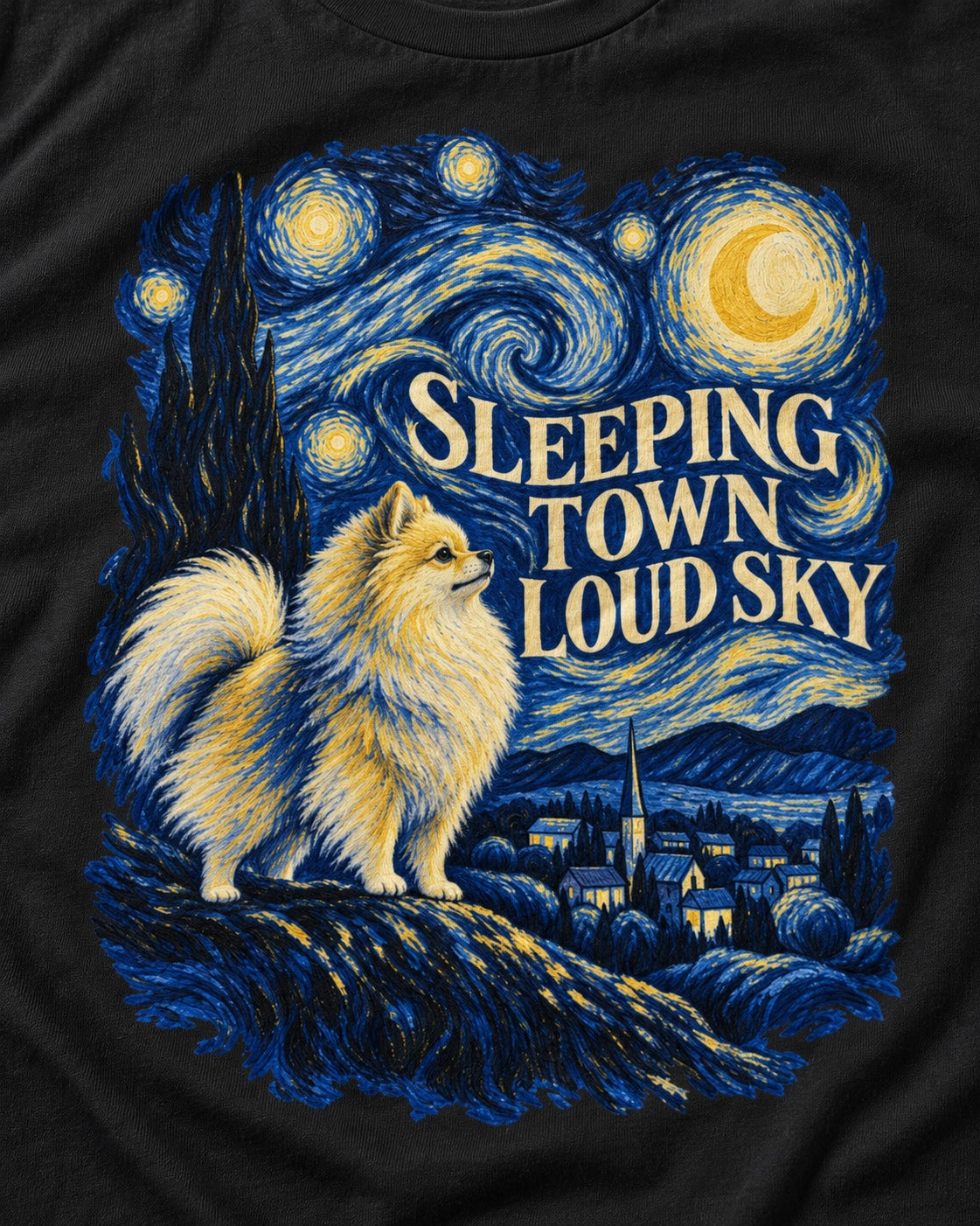 Pomeranian Sleeping Town Loud Sky Starry Night Graphic T-Shirt in Black, close-up of the graphic