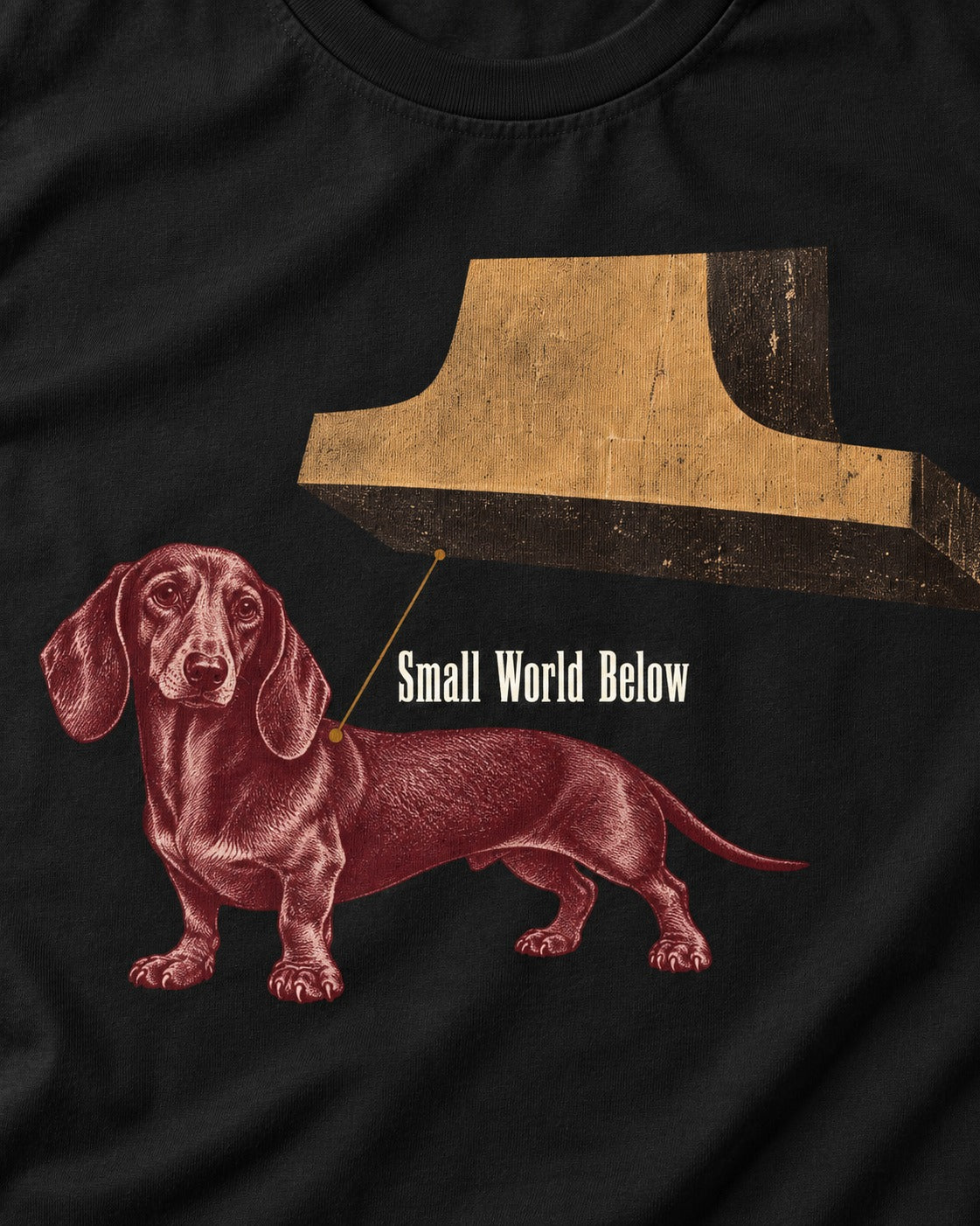 Dachshund Small World Below Giant Shoe Graphic T-Shirt in Black, close-up of the graphic