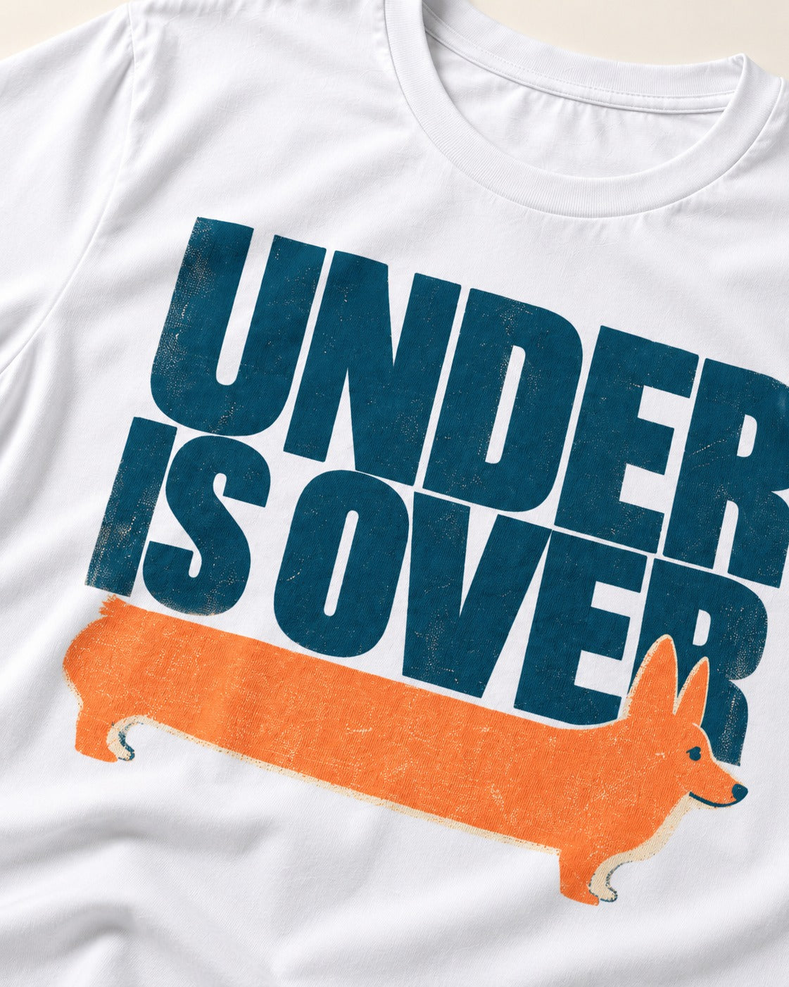 Corgi Under Is Over Graphic T-Shirt in White, close-up of the graphic