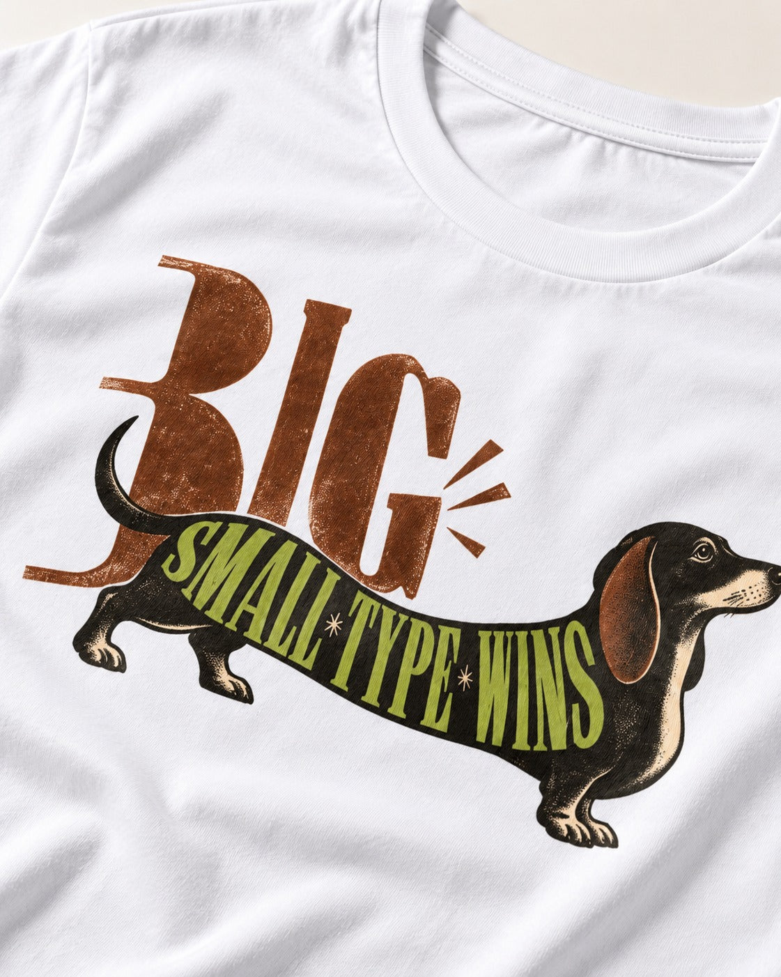 Dachshund Small Type Wins T-Shirt in White, close-up of the graphic