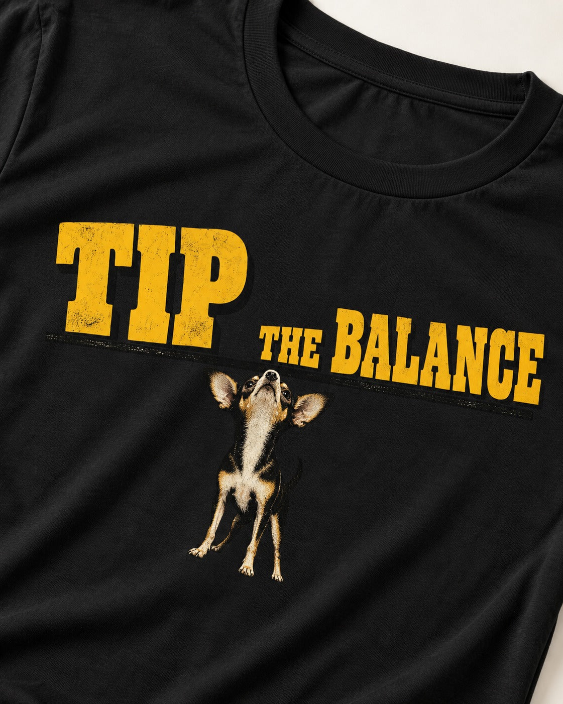 Chihuahua Tip the Balance Beam Graphic T-Shirt in Black, close-up of the graphic