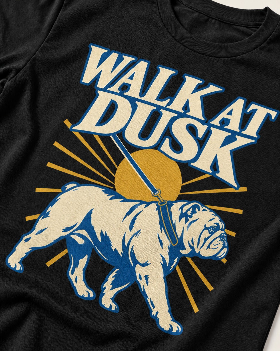 English Bulldog Walk at Dusk Sunset Graphic T-Shirt in Black, close-up of the graphic