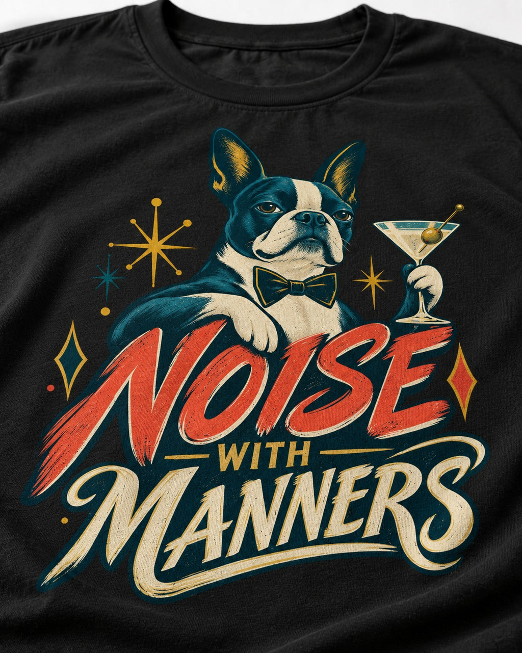 Boston Terrier Noise With Manners Cocktail Graphic T-Shirt in Black, close-up of the graphic