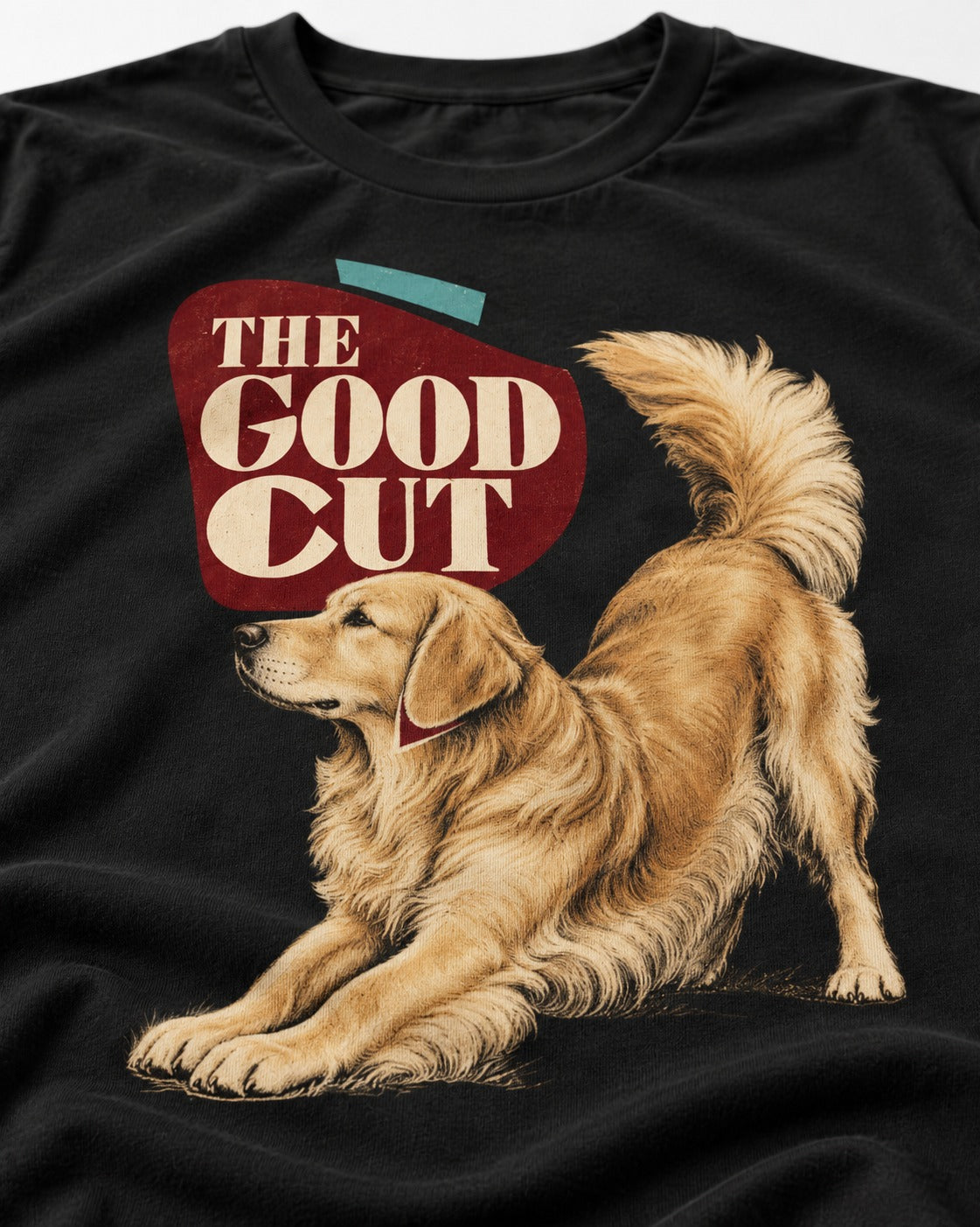 Golden Retriever The Good Cut Play Bow Graphic T-Shirt in Black, close-up of the graphic
